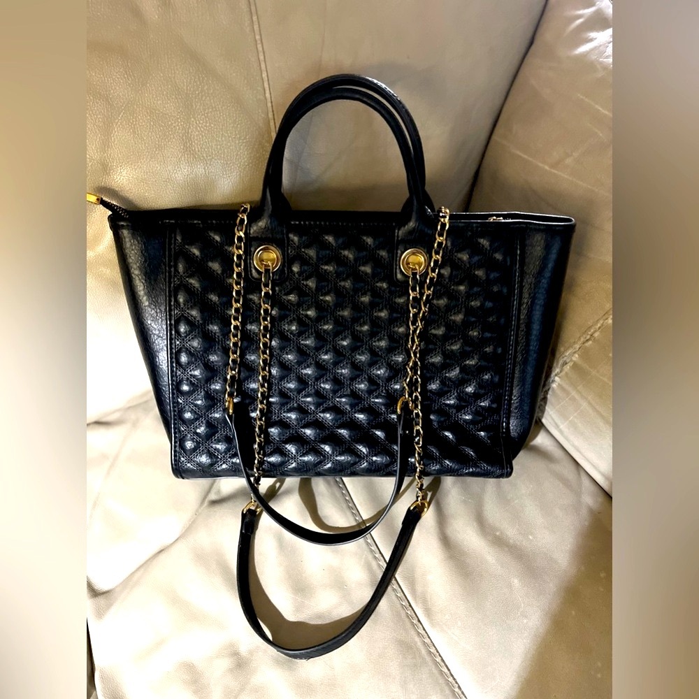 Brand new stunning  foreign designed 5 pockets black elegant Leather handbag .